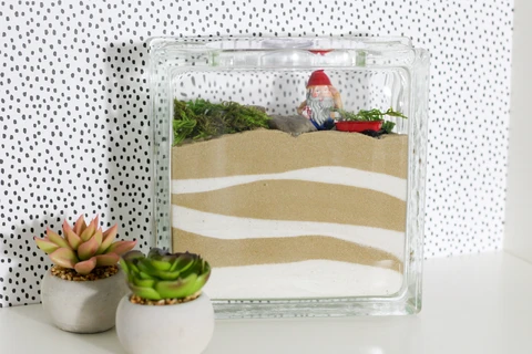 Create an indoor fairy garden for your home!  This easy project takes only 15 minutes to make.